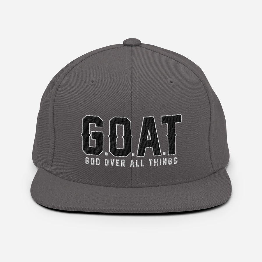 Snap Back G.O.A.T 3d puff Black text hat