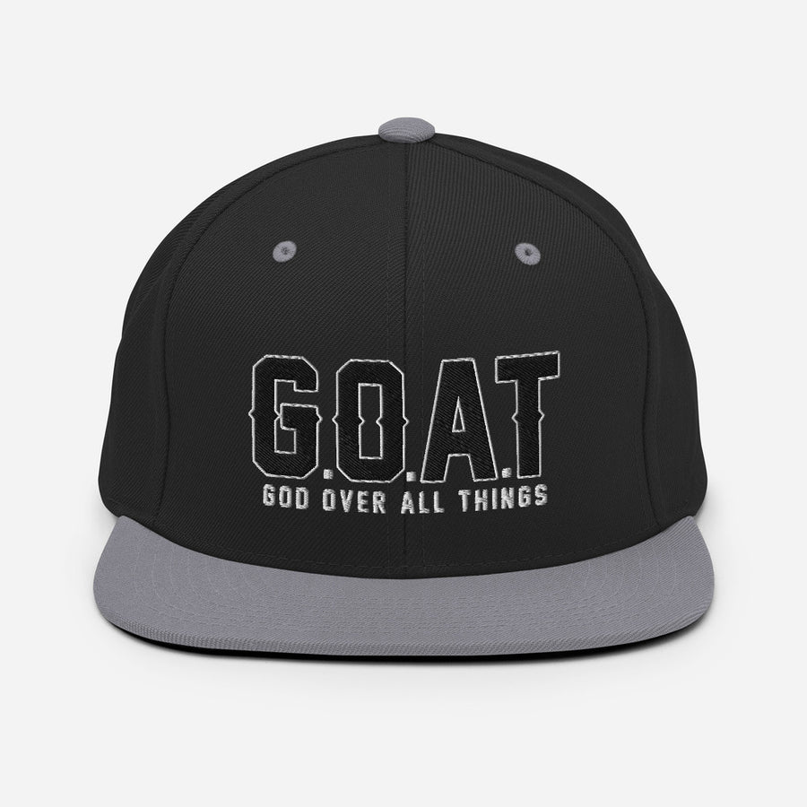 Snap Back G.O.A.T 3d puff Black text hat