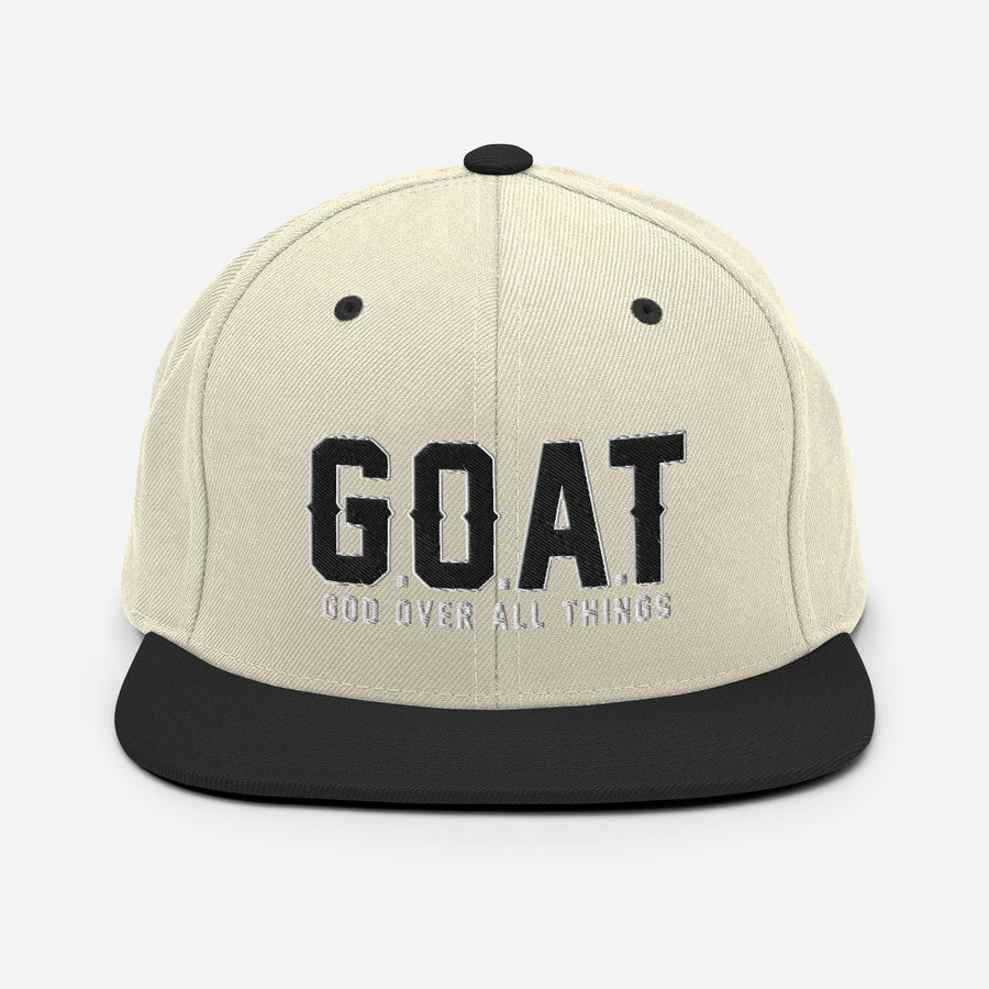 Snap Back G.O.A.T 3d puff Black text hat