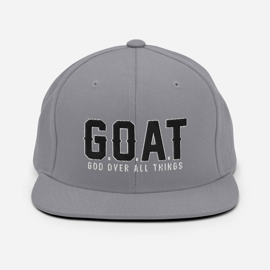 Snap Back G.O.A.T 3d puff Black text hat